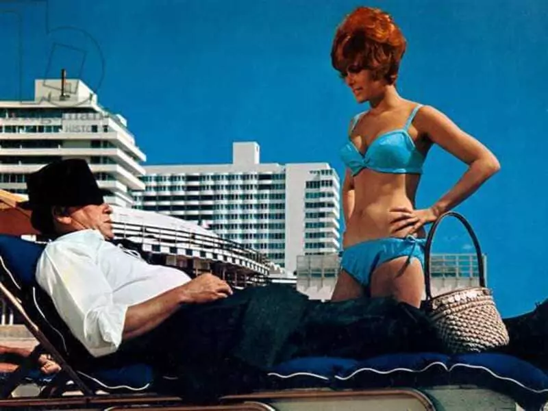 Jill St. John and Frank Sinatra in a scene.