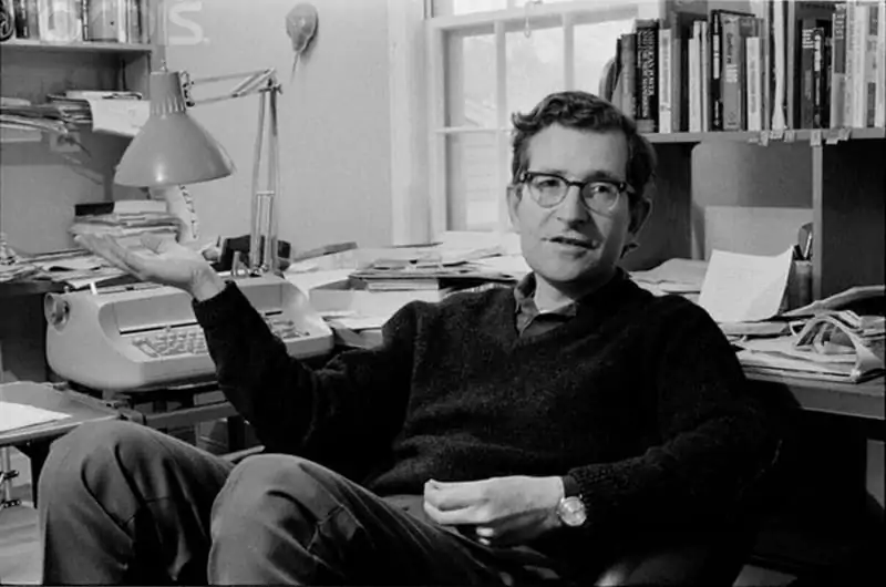 Young Noam Chomsky in his working space.